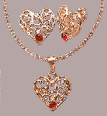 Conjunto folheado a ouro com brincos e pingente