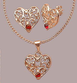 Conjunto folheado a ouro com brincos e pingente